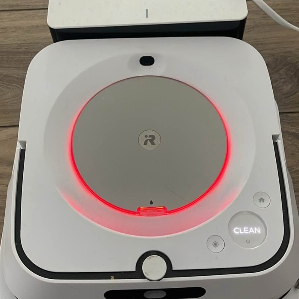 White and Gray Robotic Cleaner